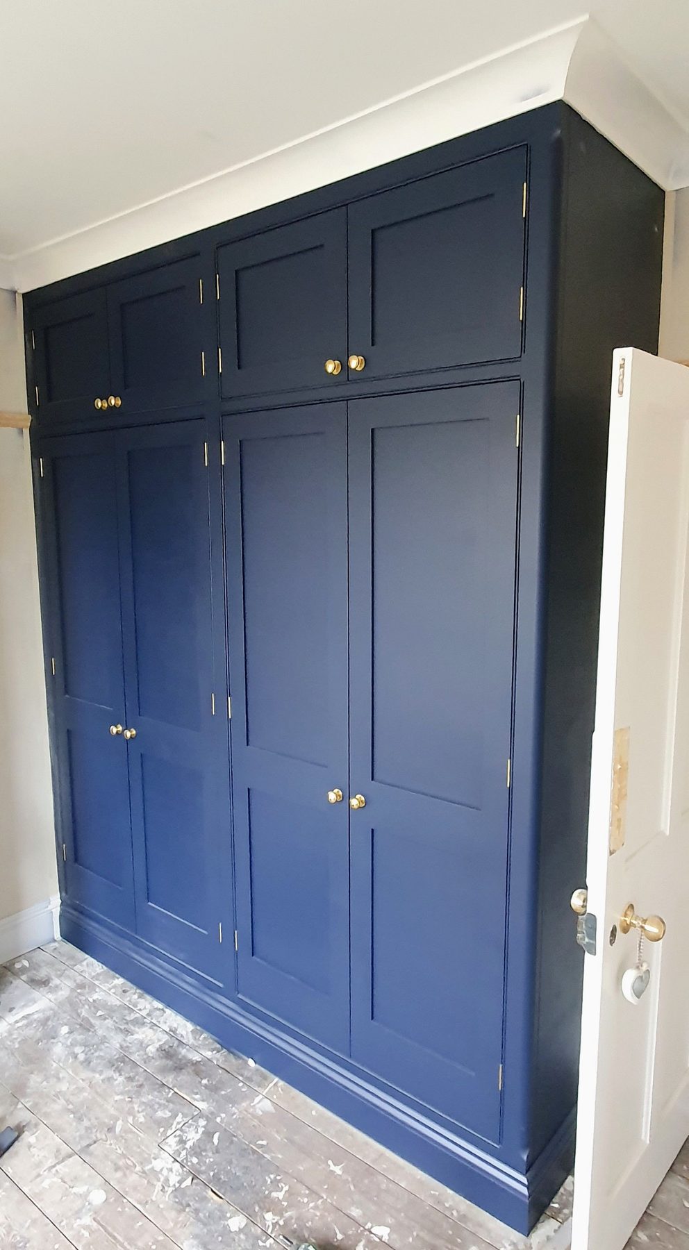 Fitted navy bedroom wardrobes